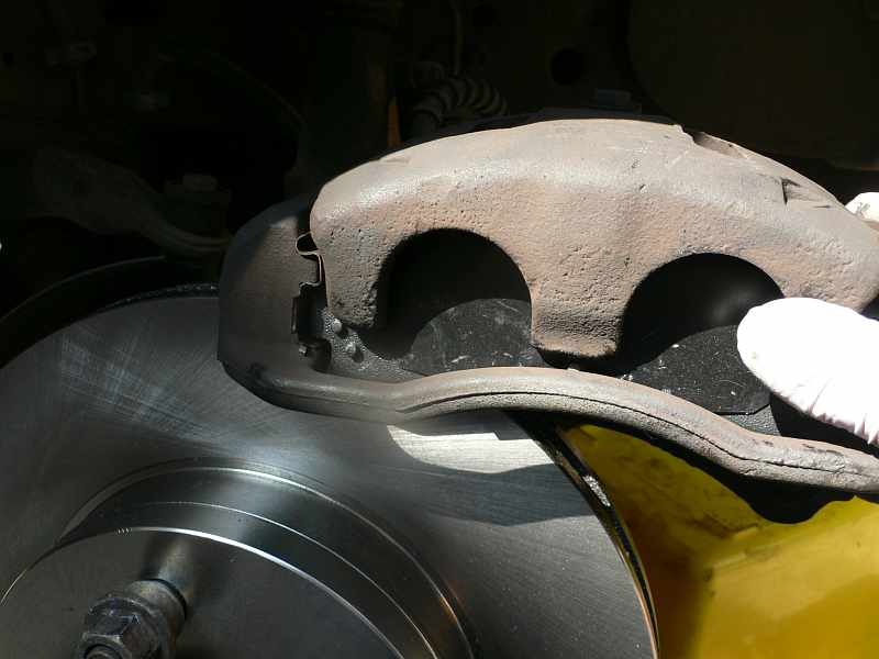 Install Brake Caliper on Rotor - Ford Explorer